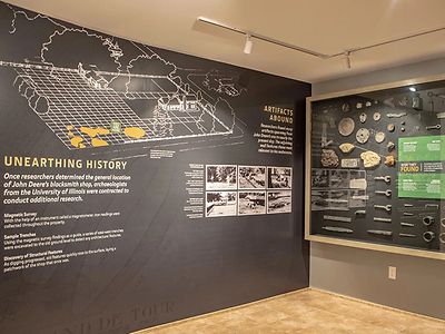 A display of John Deere artifacts and information