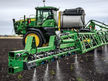 A John Deere See & Spray Select with advanced technology sprays only emerged weeds. 
