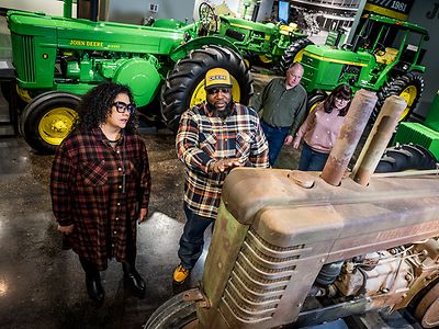 Tractor and Engine Museum visitors enjoy seeing vintage equipment 